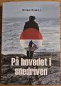 Billede af bogen På hovedet i snedriven Billede af bogen På hovedet i snedriven